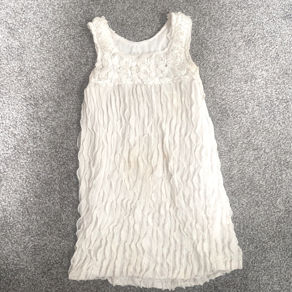 Cream colored mini dress.